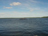 Камень в озере